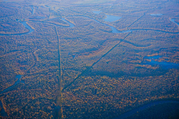 Aerial view of blue river of Houston Suburban	