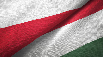 Poland and Hungary two flags textile cloth, fabric texture