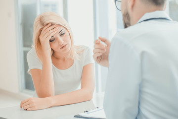 Fototapeta premium Doctors talk to patients, the concept and description of symptoms, the illness.