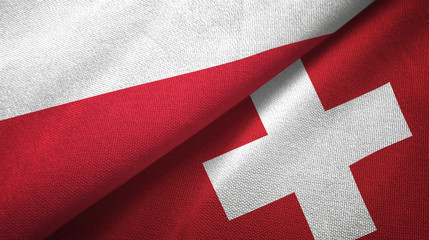 Poland and Switzerland two flags textile cloth, fabric texture