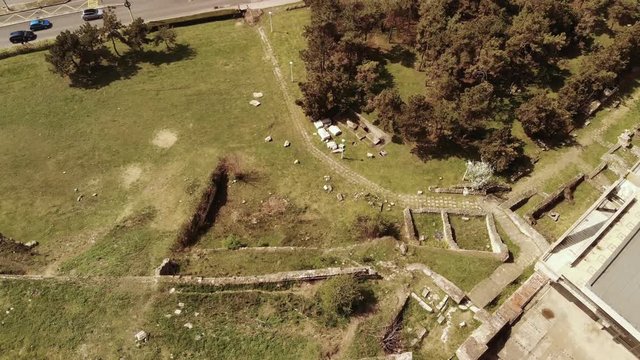 Aerial drone movement with a straight down point of view over the Roman edifice with Mosaique from Constanta, Romania, anciently known as Tomis