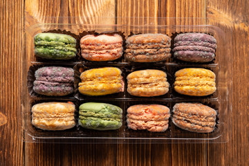 top view set of moldy macaroons on a wood table