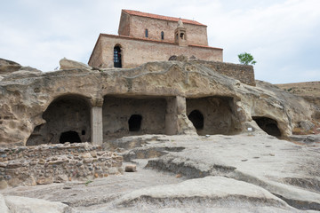 Fototapeta na wymiar Gori, Georgia - Jul 05 2018: Ruins of Uplistsikhe. a famous Historic site in Gori, Shida Kartli, Georgia.