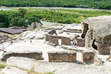 Fototapeta na wymiar Gori, Georgia - Jul 05 2018: Ruins of Uplistsikhe. a famous Historic site in Gori, Shida Kartli, Georgia.