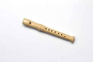 recorder flute isolated on white background flat lay