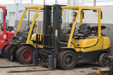 Forklifts in warehouse