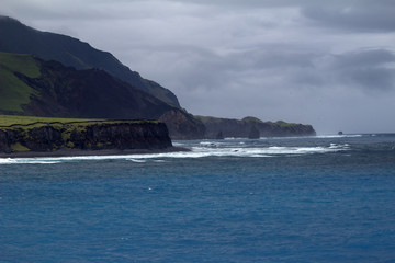 Fototapeta na wymiar The amazing coast of the Island of Tristan da Cunha - the township is small and called Edinburgh of the Seven Seas. Totally remote. ￼