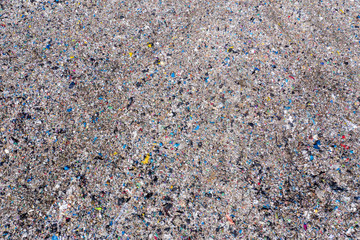 Aerial view of large landfill. Waste garbage dump, environmental pollution