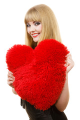 Woman holding red heart