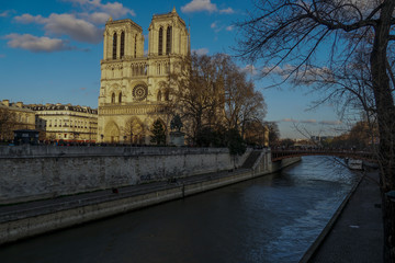 Fototapeta na wymiar Notre-Dame Cathedral, medieval Catholic cathedral on the Ile de la Cité in the fourth arrondissement of Paris, France