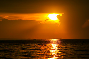 sunrise on silhouette cloud and ray sky fishing boat on sea island