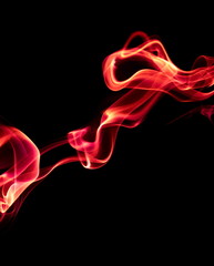 Obraz premium Red smoke on black background