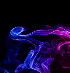 Colored smoke on black background