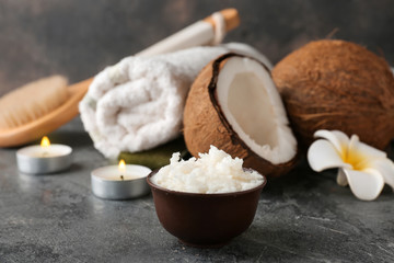 Bowl with coconut oil on table