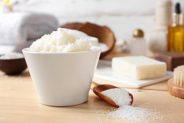 Bowl of coconut oil on table