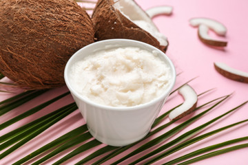 Bowl of coconut oil on table