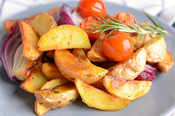 Plate with tasty baked potato, closeup