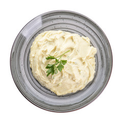 Plate with tasty mashed potato on white background