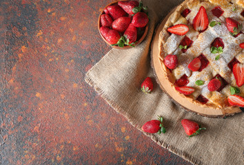 Tasty strawberry pie on color background