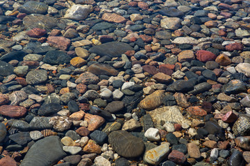 stone pebble covered with water