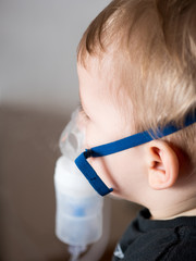 Portrait of boy with oxygen mask