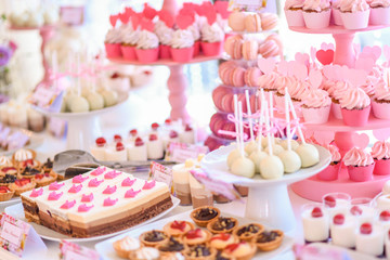 Candy bar with delicious pink sweets