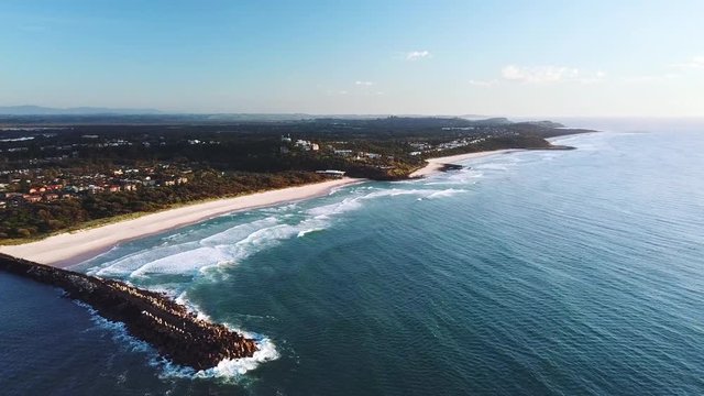 Drone flying forward showing Lighthouse beach, Shelly Beach and coastline. Ballina, Australia.