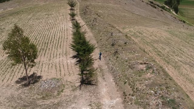 aerial images of the descent of the hill by bicycle in Apata, Peru