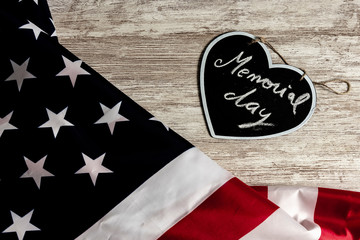 Memorial day text in black heart and united states flag