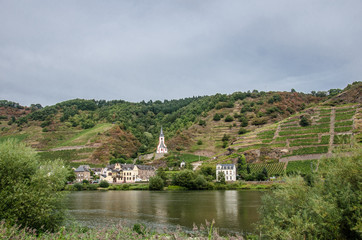 Fototapeta na wymiar Small village on the bank of Moselle river, in western Germany