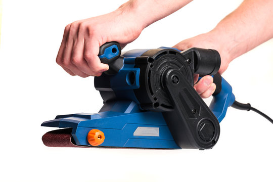sandar tool with mans hands isolatd on white background