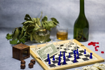 chess, dice, whiskey, domino, money