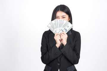 Successful beautiful Asian business young woman holding money US dollar bills in hand , business concept