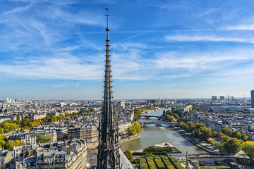 Fototapeta premium Notre Dame de Paris roof of 850 year-old (UNESCO world heritage) landmark and spectacular central Gothic spire. Cathedral photo in 2014. January 15, 2019 they were burned down in fire. Paris. France.
