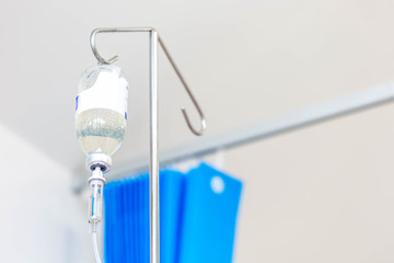 man in hospital having an intravenous drip immunoglobulin infusion