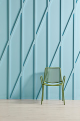 Decorative blue background and modern home object chair table and vase of plant.
