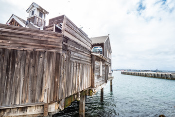Old wooden house at the oceanfront of San Diego Seaport Village - travel photography