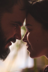 Close portrait of a young couple. Man and woman in love. Cling to each other.