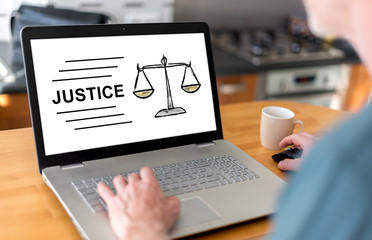 Fototapeta na wymiar Justice concept on a laptop