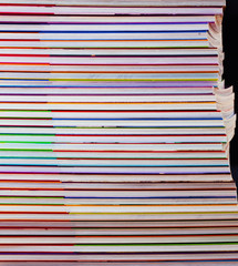 Pile of small colorful books. Close up