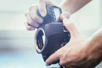 Photographer is using a professional camera, open sensor