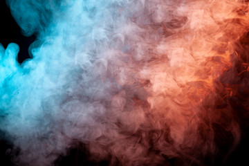 Translucent, thick smoke, illuminated by light against a dark background, divided into three colors: blue, green, pink and purple, burns out, evaporating from a steam of vape for print on t-shirt