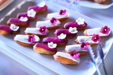 Delicious mini cakes on candy bar