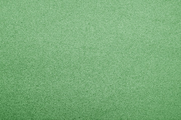 Fototapeta premium Plastic glittering texture in green color.