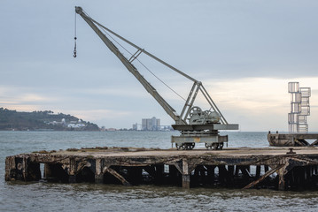 Crane seen from a boardwalk of Tagus river in Lisbon, Portugal