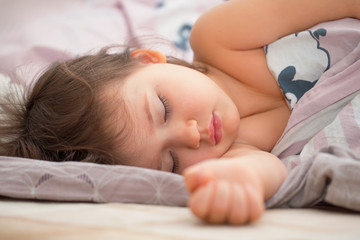 Obraz na płótnie Canvas Portrait of the sleeping beautiful girl