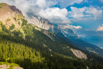 Fototapeta na wymiar Dolomite mountain landscape in Passo di Rolle, Italy.