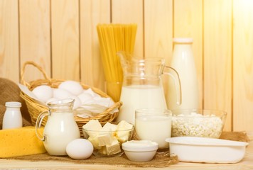 Dairy products collection on wooden table