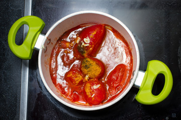 Appetizing tomatoes sauce preparation