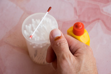 A slight wound in the right thumb is bleeding. Therefore need to put the disinfectant as a first aid.